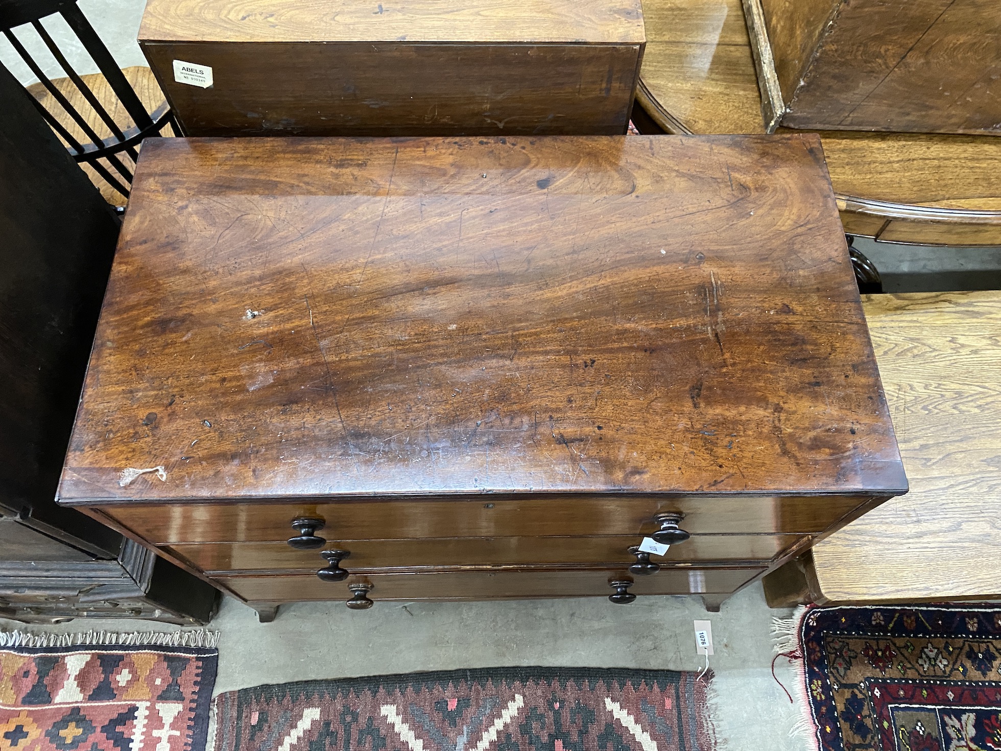 A Regency mahogany chest of three drawers, raised on bracket supports, width 96cm, depth 53cm, height 87cm